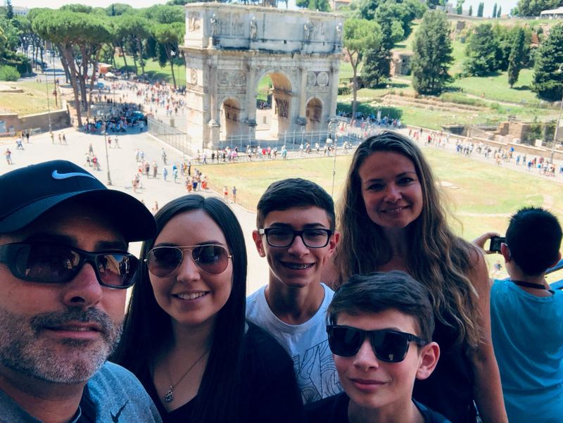 Artie, April, and the kids in front of the Arch of Constantine in Rome